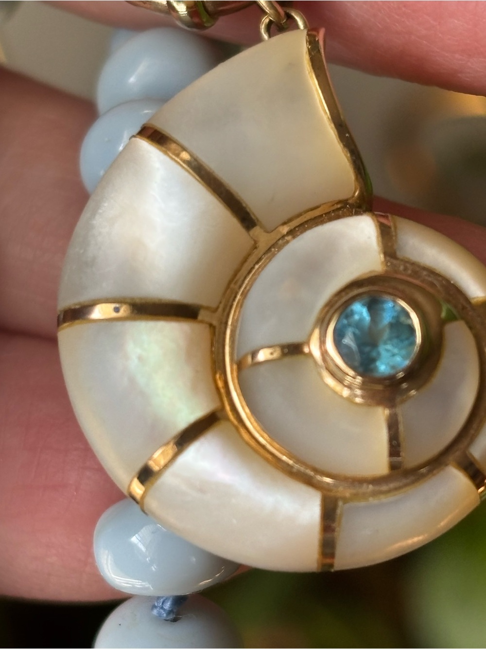 Gorgeous 14KT Mother Of Pearl Nautilus Pendant With Blue Topaz